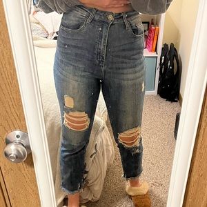 Risen Brand bootcut jeans with distressed bottoms